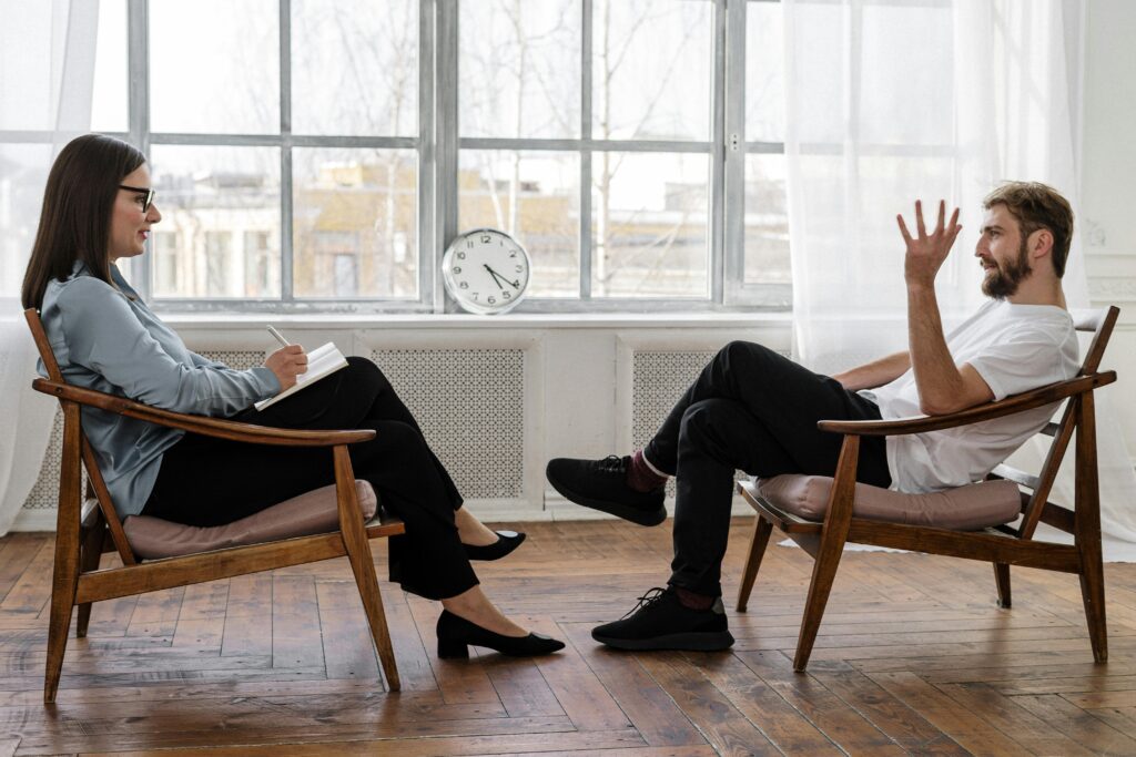 Two people in therapy session – part of a Supportive Outpatient Program at Altura Recovery